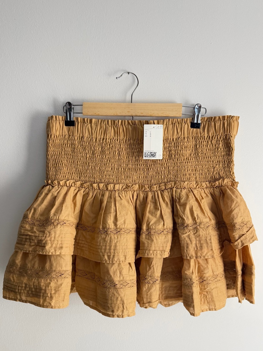 Divided Women’s Smocked Ruffle Mini Skirt in Mustard in size L
